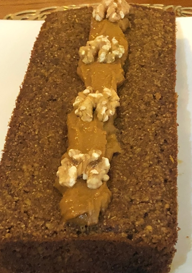 Una foto de Budín de avena, nueces y dulce de leche