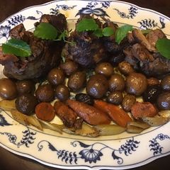 A picture of California Farm Lamb Shanks with Olives.