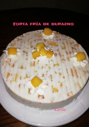 Una foto de Torta fría de duraznos😋 (sin horno)