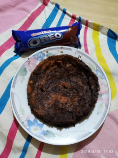 A picture of Orange Oreo Biscuit Marble Cake.