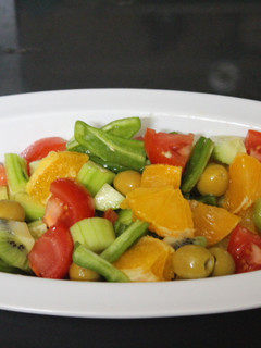 Una foto de Ensalada de naranja y kiwi