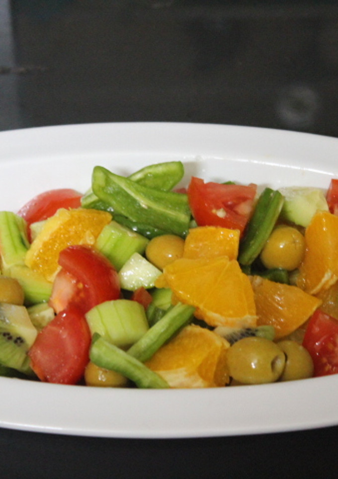 Una foto de Ensalada de naranja y kiwi