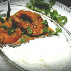 A picture of Rui Shorshe(Rohu fish in mustard paste).