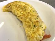 Una foto de omelette de perejil al