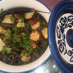 A picture of Lehsuni aloo palak.