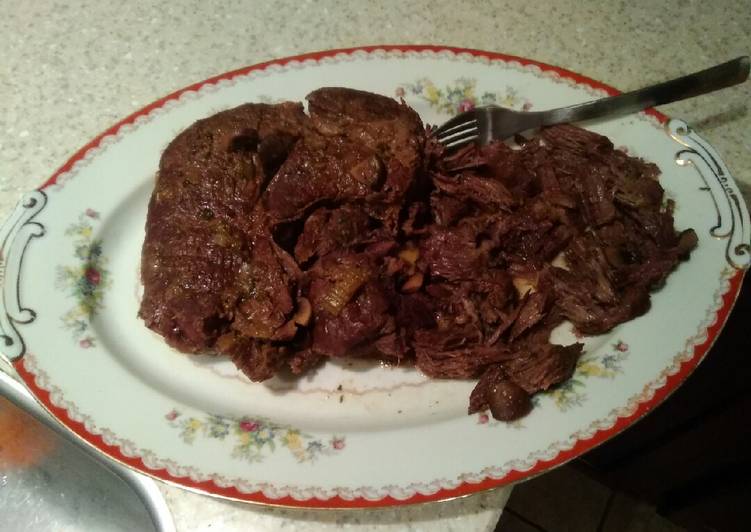 Braised beef over egg noodles/pot roast