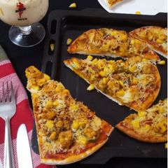 Paneer Tikka Pizza A picture of Paneer Tikka Pizza.