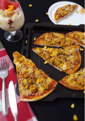 A picture of Paneer Tikka Pizza.
