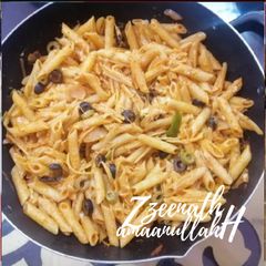 A picture of Cheesy Olives Loaded Penne Pasta.