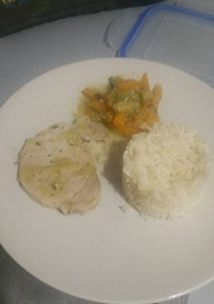 Une photo de Roti de porc, ses petits légumes et sa timbale de riz