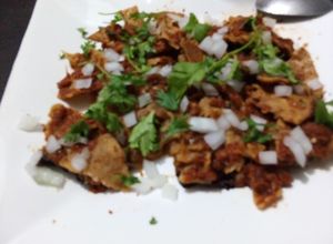 Una foto de Chilaquiles de cascabel y tomatillo de milpa al pulque las Correa