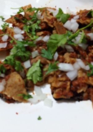 Una foto de Chilaquiles de cascabel y tomatillo de milpa al pulque las Correa