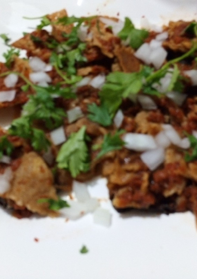Una foto de Chilaquiles de cascabel y tomatillo de milpa al pulque las Correa