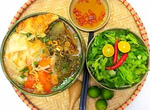 Hình của món Canh chua đầu cá hồi (hoặc chế thành lẩu đầu cá hồi).