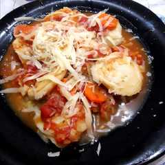 Foto principal de Sorrentinos de calabaza caseros con salsa