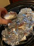 Slow cooker ribs and potatoes and corn on the cob
