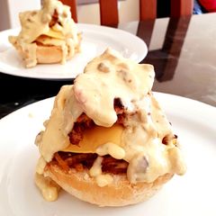 Bacon,Beef, Cheese Burger with some mushroom sauce A picture of Bacon,Beef, Cheese Burger with some mushroom sauce.