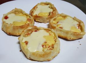 Una foto de Canastitas de ricota, jamón y queso