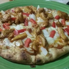 A picture of Chicken Tikka Masala Pizza.