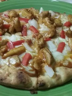A picture of Chicken Tikka Masala Pizza.