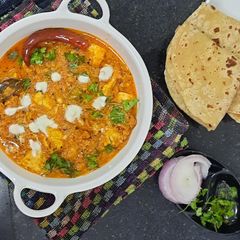 A picture of Paneer butter masala.