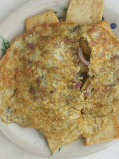 A picture of Fried yam and fried egg.