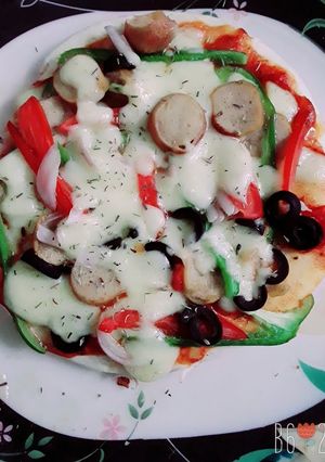 A picture of Sausages pizza.