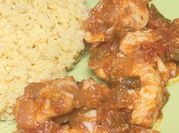 Una foto de bulgur con tomate