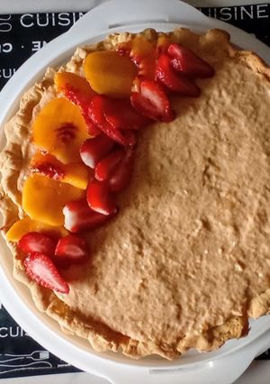 Una foto de Tarta de queso mascarpone y duraznos frescos
