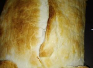 Una foto de Hojaldre de ricotta, cuartirolo y verdeo