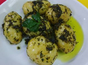 Una foto de Papas cambray al cilantro