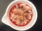 Une photo de hareng fumé et fruit