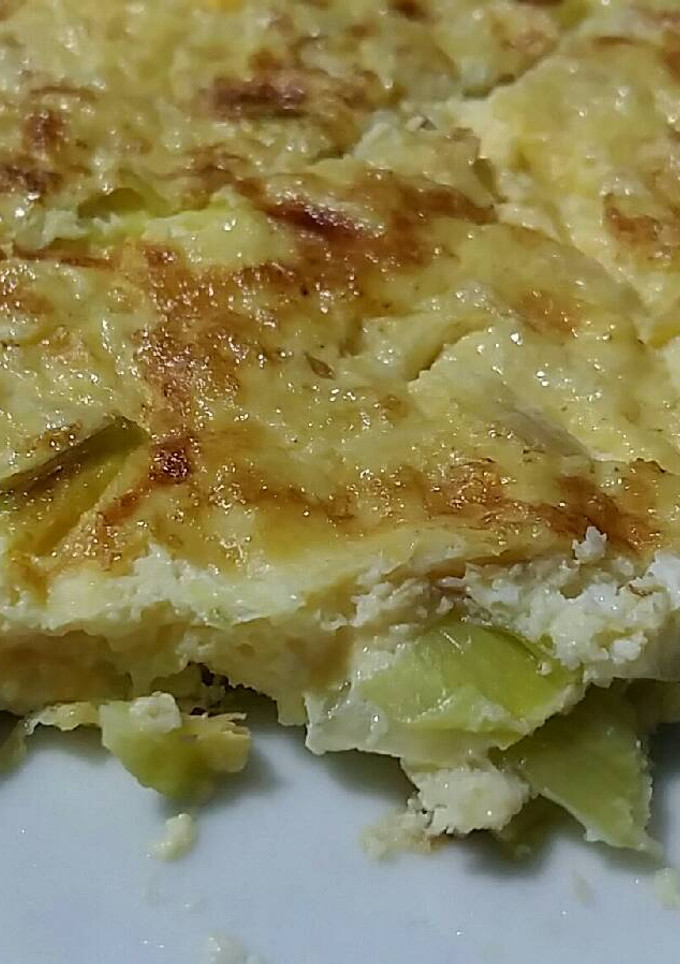 Una foto de Tortilla de puerros, cebolla y tranchetes