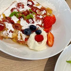 A picture of Raspberry and almond Clafoutis.