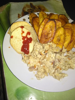 A picture of Scrambled Eggs with shrimps paired with Fried plantain and Yam.