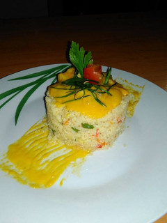 Una foto de Cuscus de vegetales con pollo en salsa de mangos