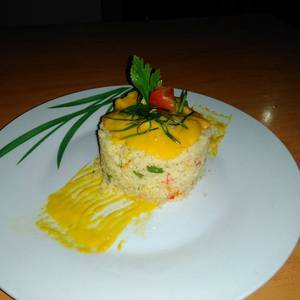 Cuscus de vegetales con pollo en salsa de mangos