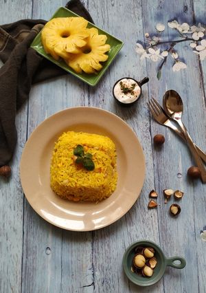 A picture of Pineapple pulao with macadamia nuts.