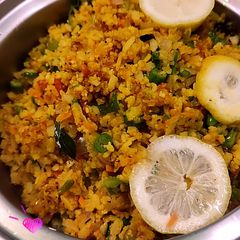 A picture of Yellow vegetables poha.