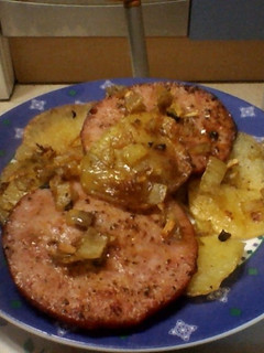 Una foto de Lomo adobi con poteitos