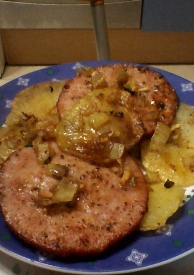 Una foto de Lomo adobi con poteitos