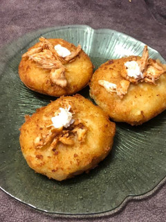 Una foto de Patata rellena de pollo con queso