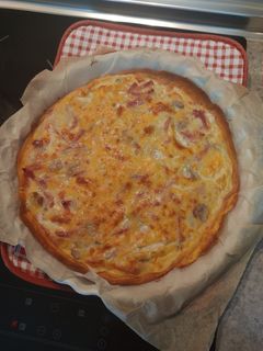 Una foto de Quiche de bacon y champiñones