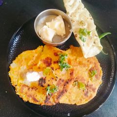 A picture of Green peas paratha (whole wheat flour).