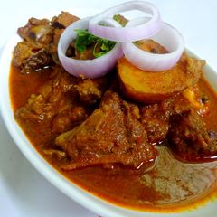 A picture of Mutton Potato Jhol.