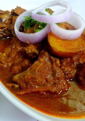 A picture of Mutton Potato Jhol.