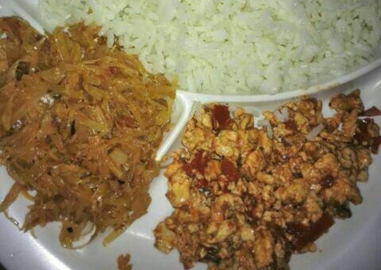 Scrambled eggs, fried cabbage and plain rice