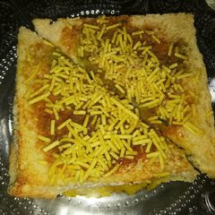 A picture of Masala toast sandwich.