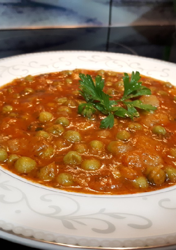 Una foto de Guisantes con mucha salsa vegano