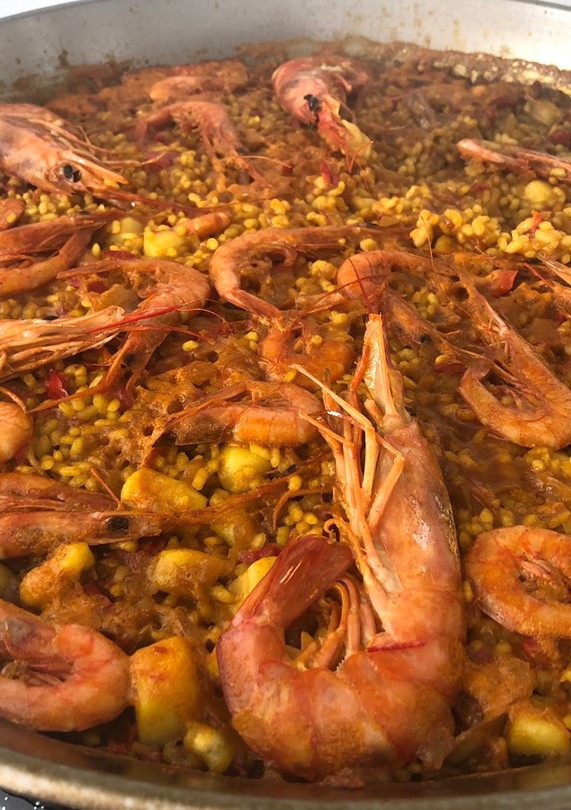 Una foto de Paella de marisco
